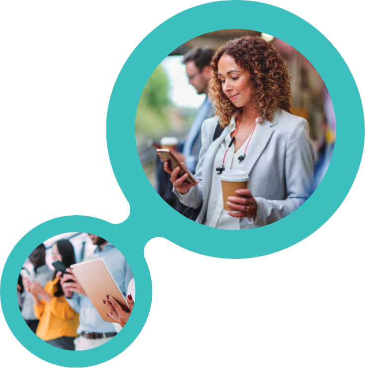 Woman holding coffee and cell phone